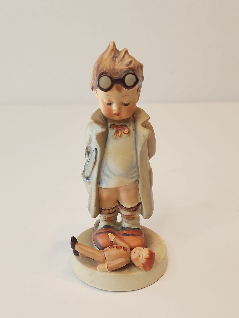 Hummel Goebel #127 Dr. Boy W/Spectacles Porcelain Boy Figurine with Doll At Feet